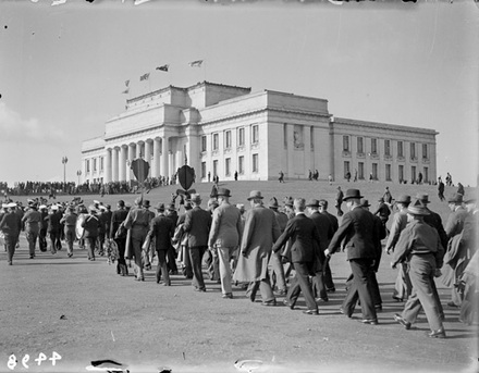 Anzac veterans marching towards the cenotaph in front of the Auckland War Memorial Museum. image item