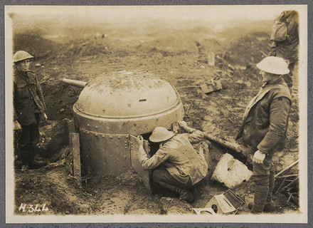 New Zealanders examining a captured anti-tank gun. 3rd N.Z.R.B. Clapham Junction.