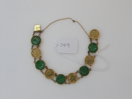 gold and jade bracelet